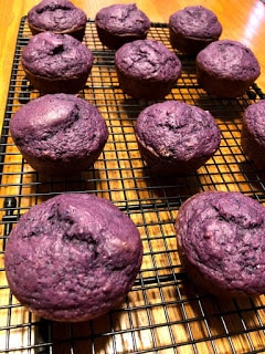 Purple sweet potato muffins on a cooling rack