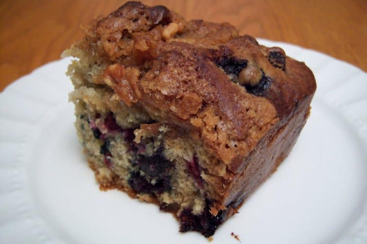 Blueberry Crumb Cake on round white plate