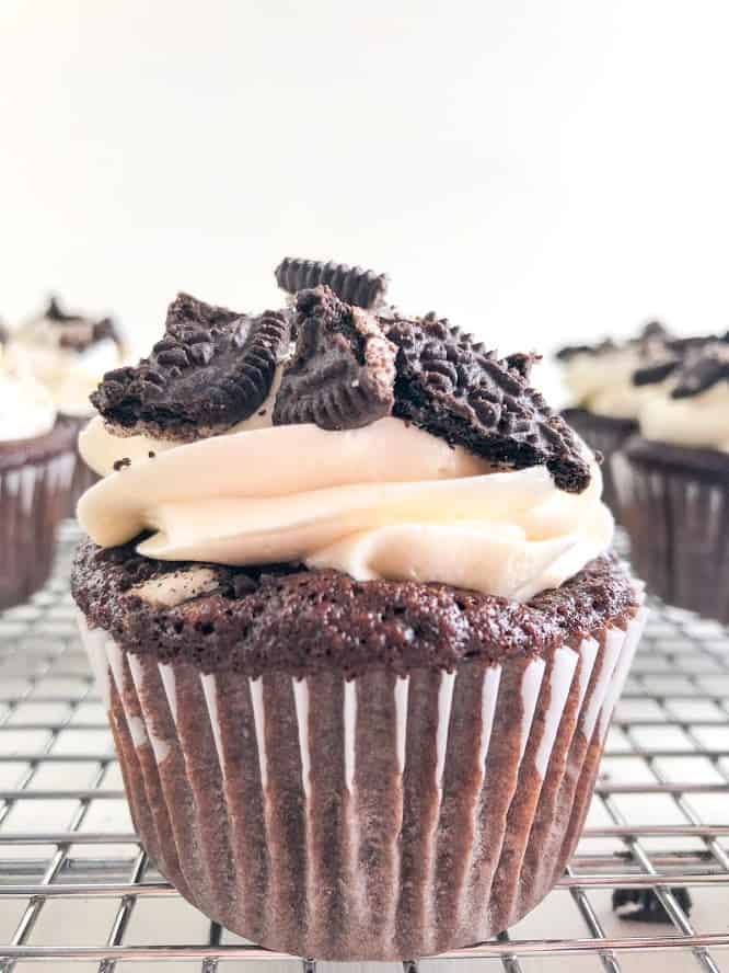 Oreo Cupcakes with Cream Cheese Buttercream on silver cooling rack